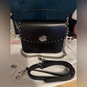 Coach Cassie 19 with Rivets